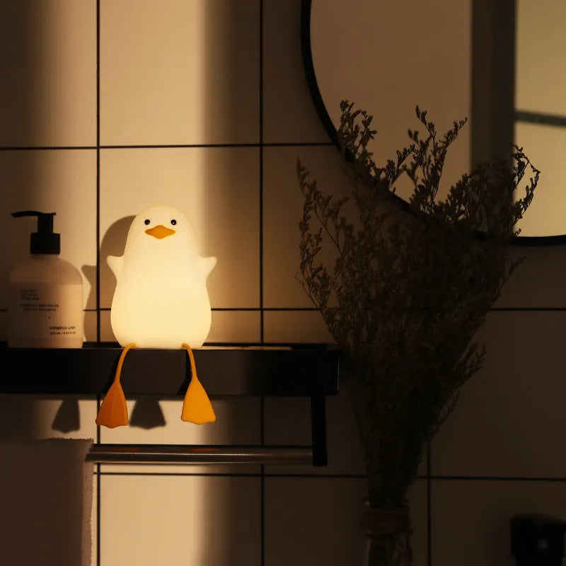 Seagull-shaped silicone night light for babies with soft glow and tap controls