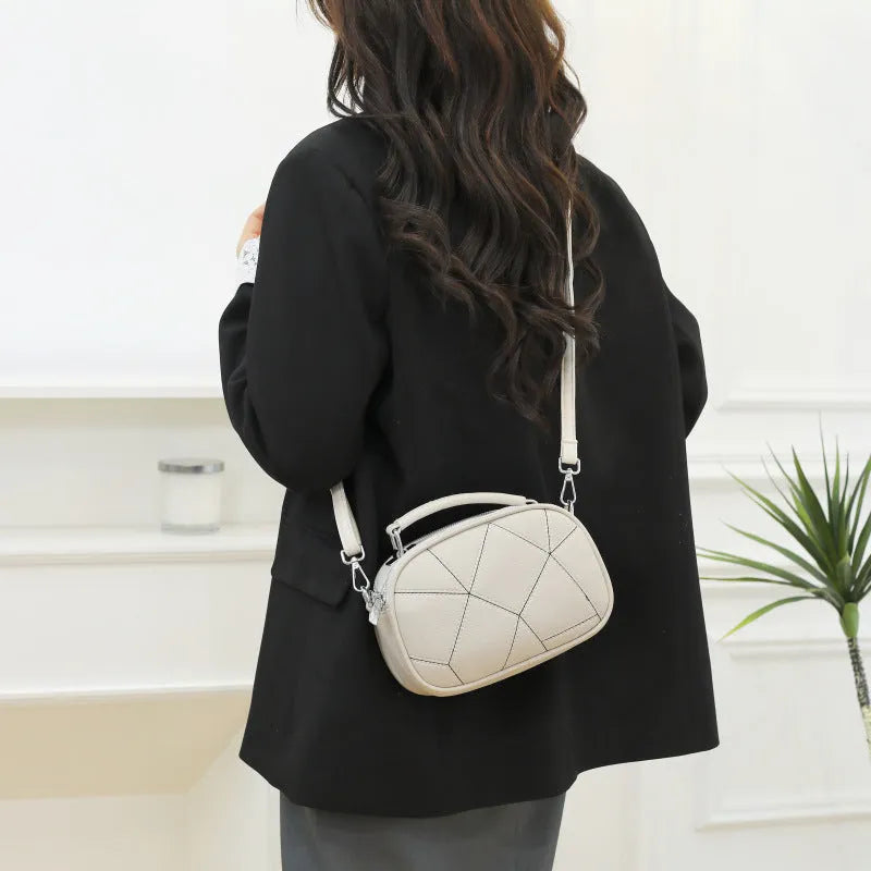 Three-layer patchwork small bag in round suitcase shape measuring 20x15 cm