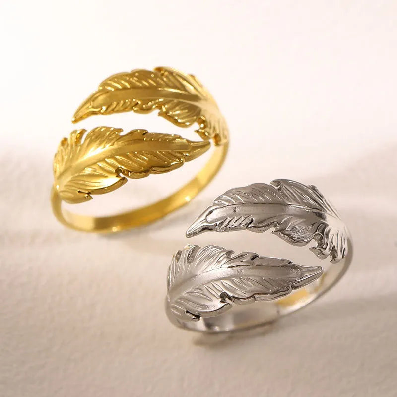 Adjustable titanium steel feather ring with silver electroplated finish on female hand