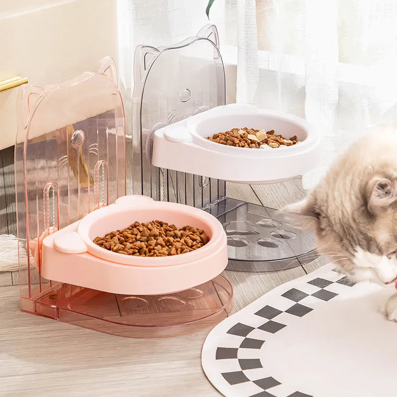 Grey pet bowl with removable hanging cage and adjustable height for feeding