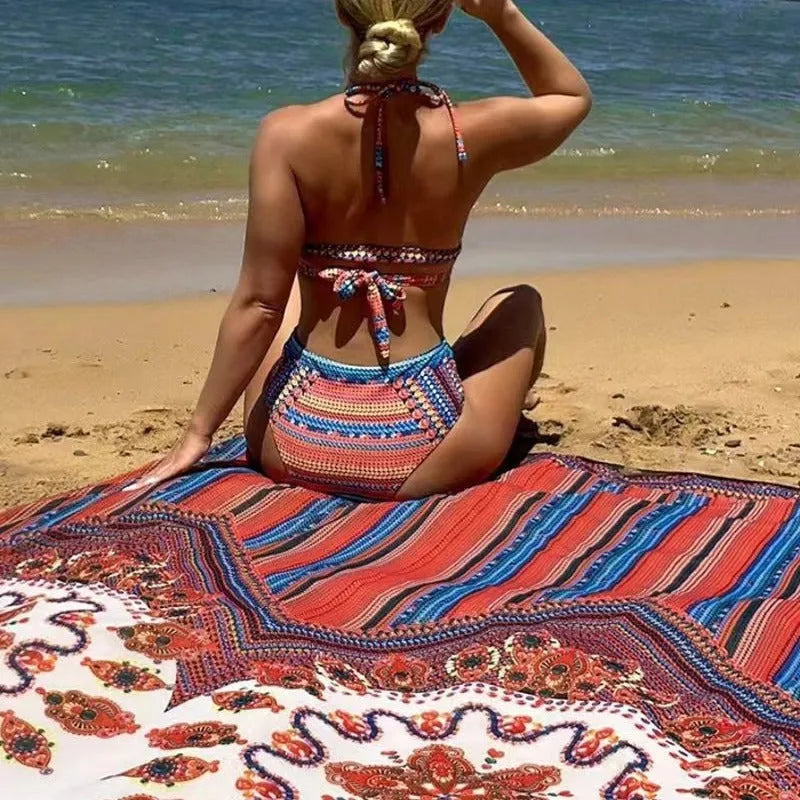A three-piece women's swimsuit set showing a cutout blouse, high-waist briefs, and a sleeveless cover-up coat.