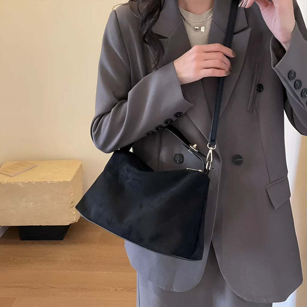 Retro frosted suede underarm handbag in black, brown or coffee with single strap, lock and stitching details.