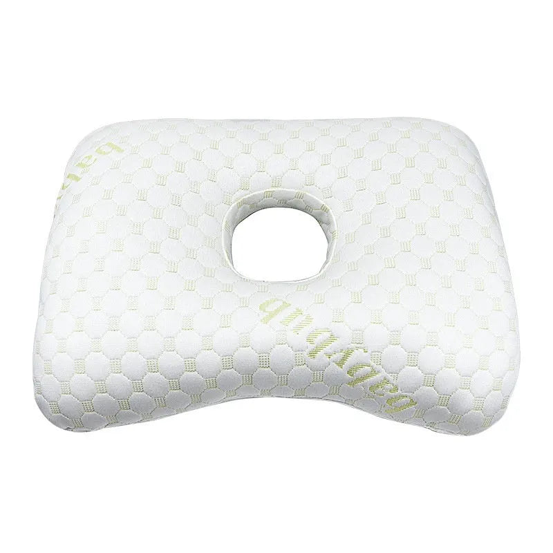 Beauty salon single hole ear pillow in Boer Grey colour on a treatment bed.
