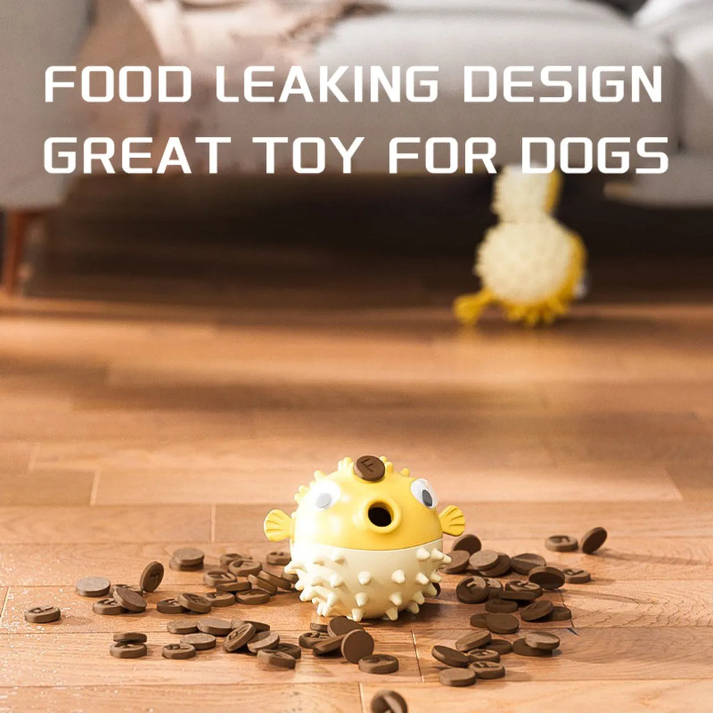 Yellow vinyl fish-shaped dog chew toy with textured surface for teeth cleaning.