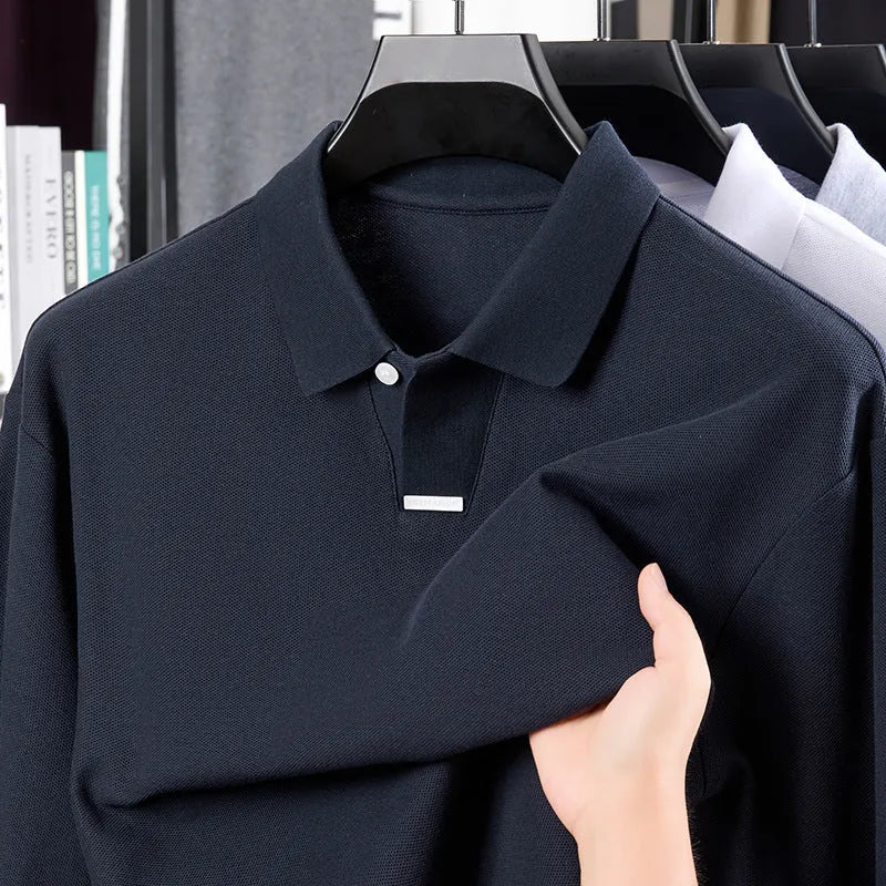 Men's loose fit cotton polo shirt in grey with asymmetrical detail and long sleeves.