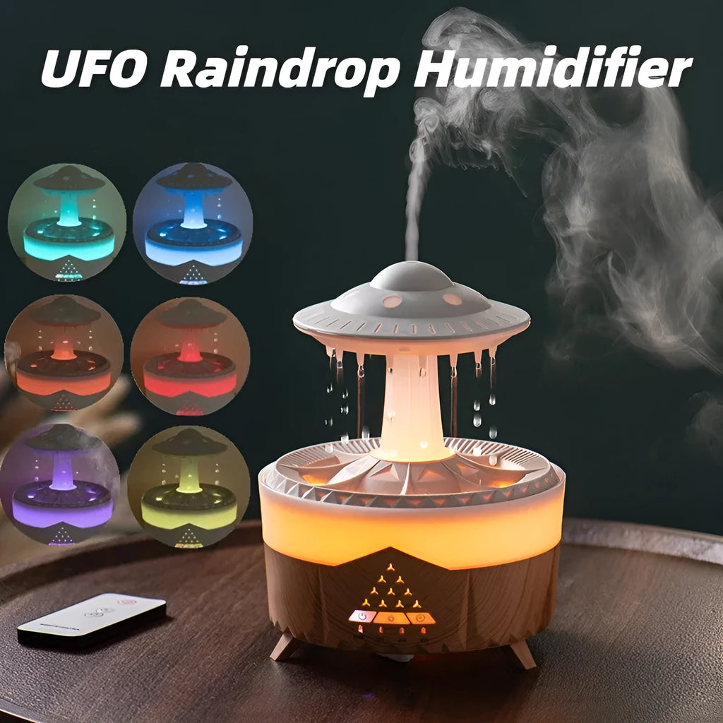 White UFO-shaped humidifier with water droplets creating mist and rain sounds
