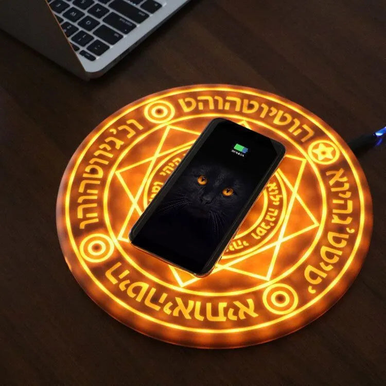 Magic Array second generation wireless charger in retro yellow on a wooden surface