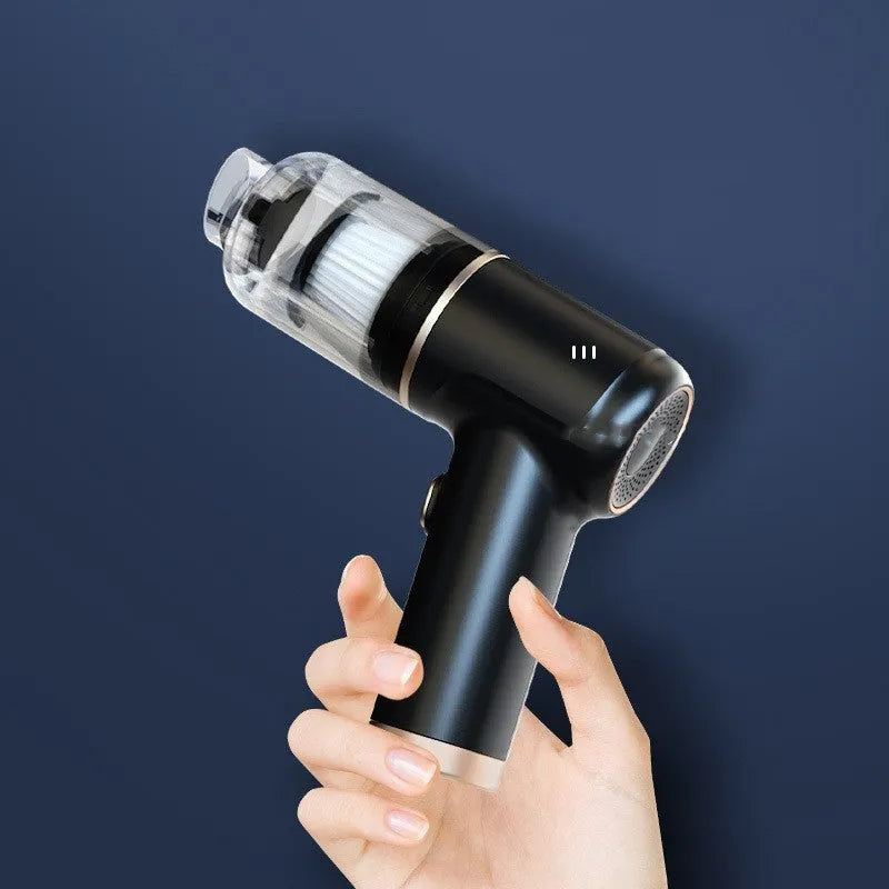 Black wireless handheld car vacuum cleaner with multiple nozzle attachments on charging cable
