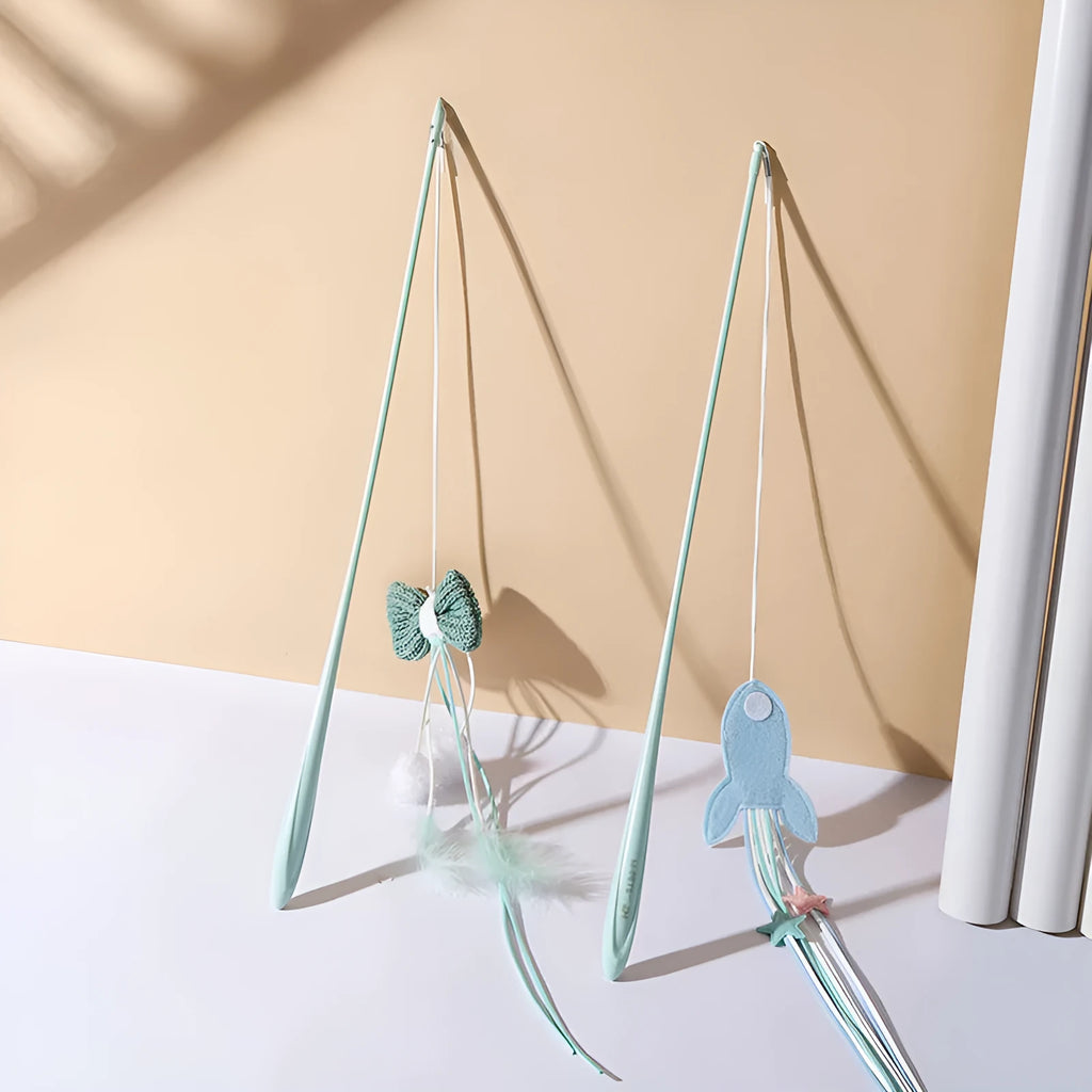 Blue cat teaser toy with a long pole, inflatable ego shape, and colourful feathers.
