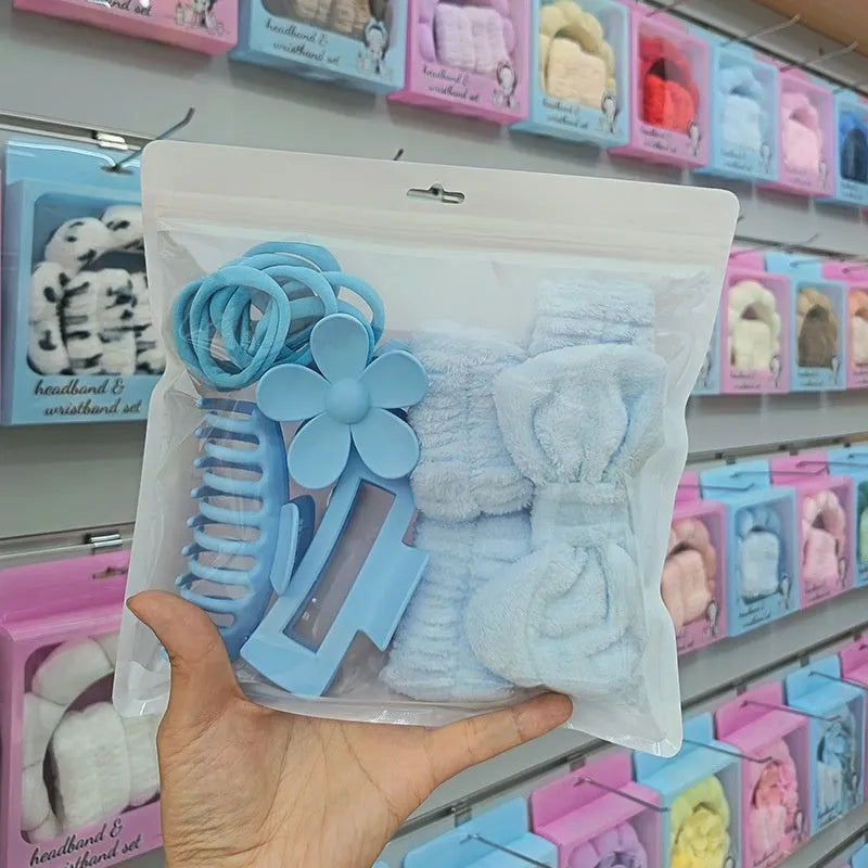 16-piece plaid bow hair band set with wrist strap and barrettes in nine colours including pink and blue.
