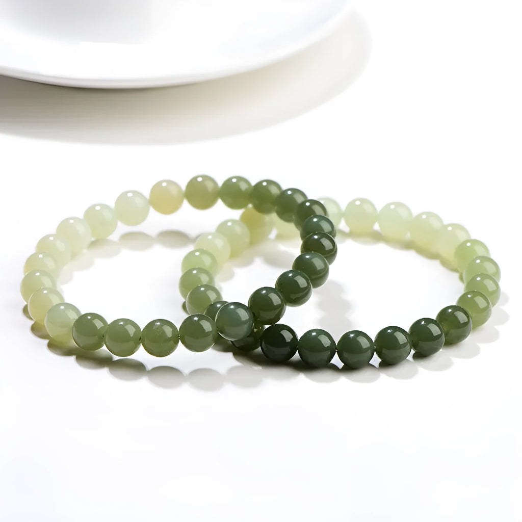 Natural clear water Hetian jade bracelet with gradient colour beads on wrist