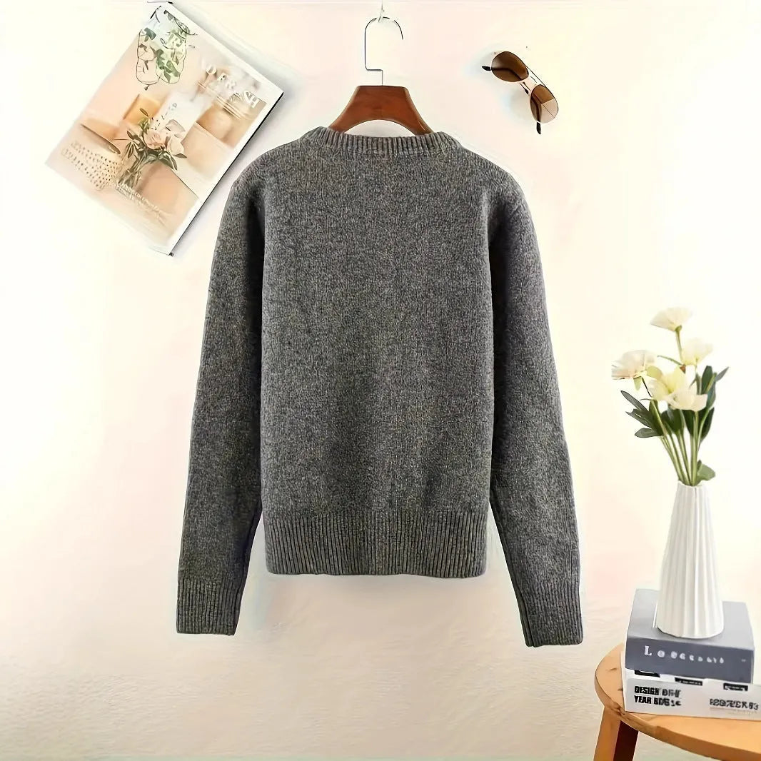 Dark grey women's button-up cardigan sweater with long sleeves on a hanger.