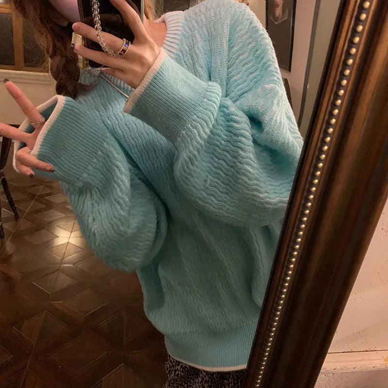Women's loose fit pullover sweater in solid blue colour with regular sleeves