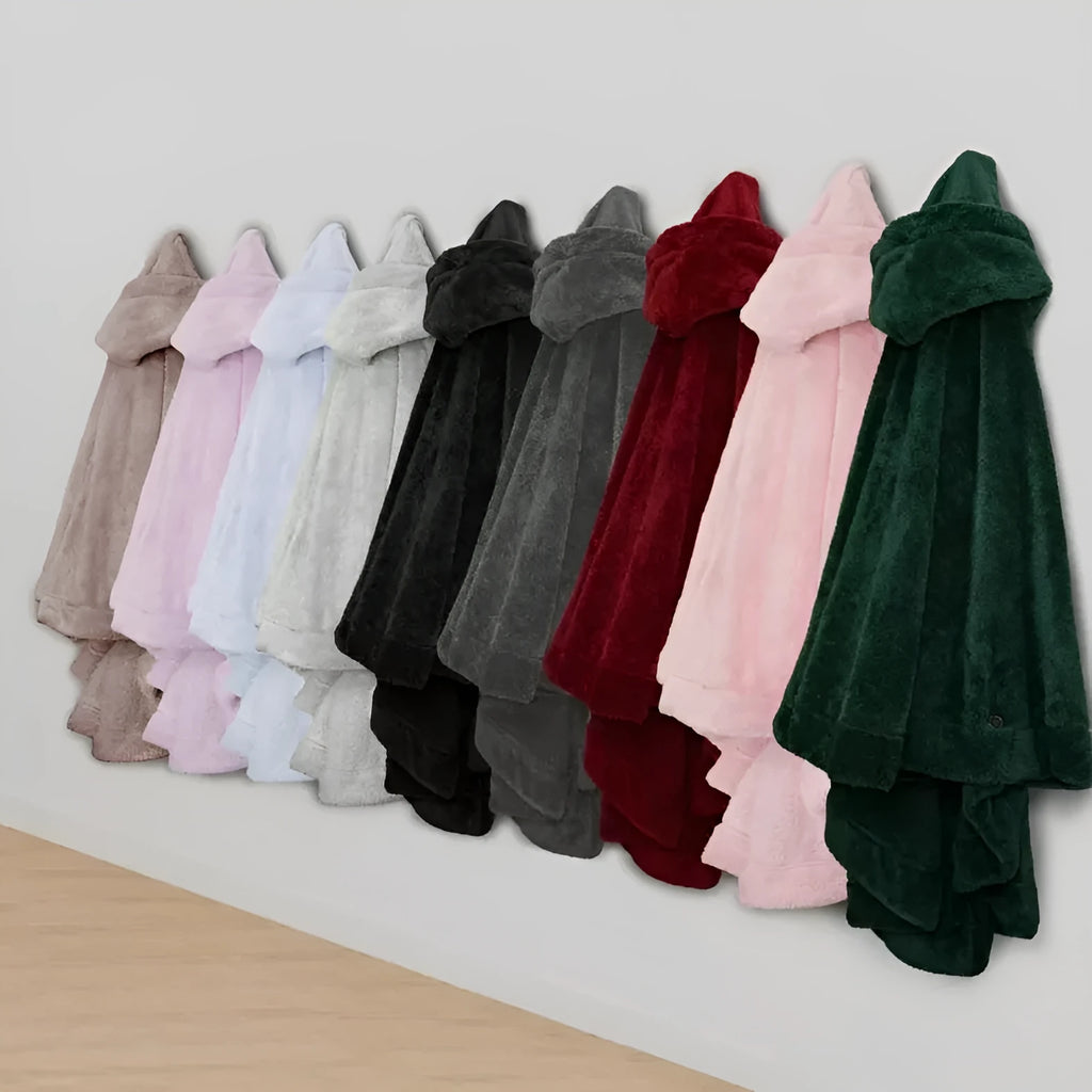 A thick pink hooded bathrobe with long sleeves and a cardigan-style front on a hanger.