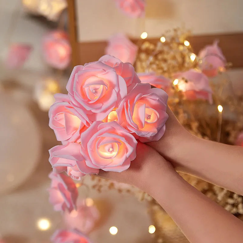 LED rose fairy lights with battery pack showing pink foam rose-shaped covers on 1.5 metre cable