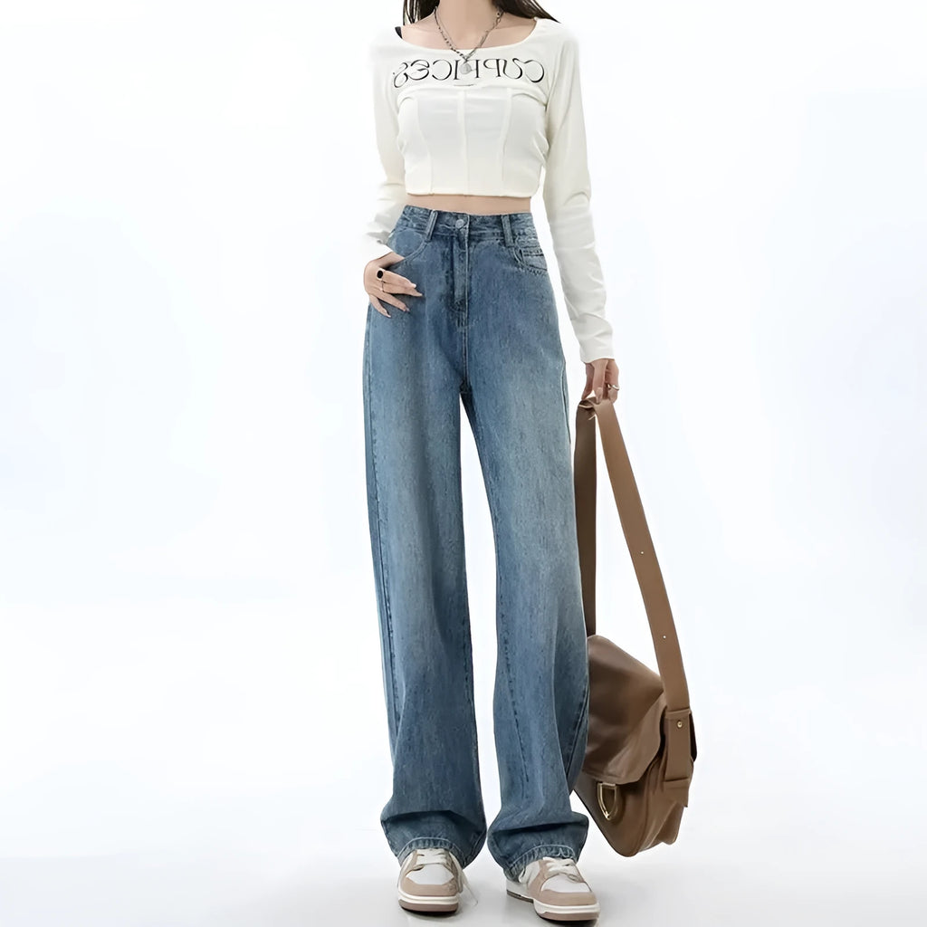 Retro blue women's wide leg jeans with a high waist and straight leg on a hanger
