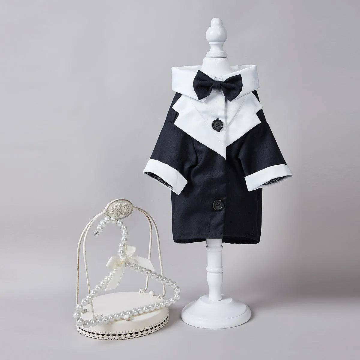 Chinese-style four-legged polyester wedding suit for a dog or cat in black.