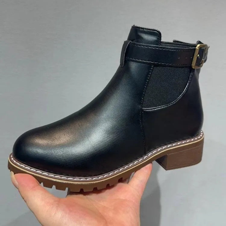 Women's round toe ankle boots with belt buckle decoration in black or chocolate brown