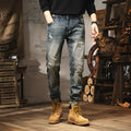 Man wearing vintage blue loose-fit jeans with a fleece lining and drawstring waist.