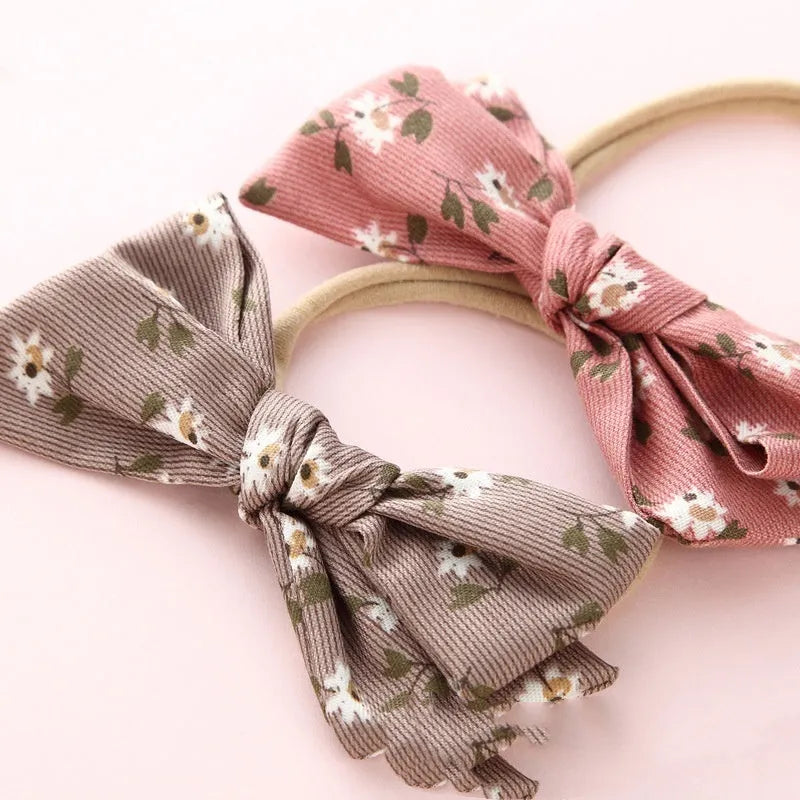Children's knotted bow hair ring with fabric construction and printed patterns