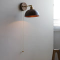 Inn Niche Nordic wooden wall-mounted bedside lamp in walnut colour finish.