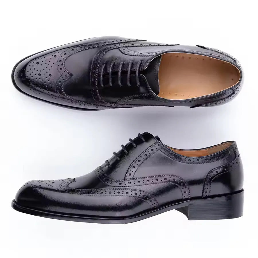 Purple men's Oxford shoes with hand-carved detailing and a pointed toe.