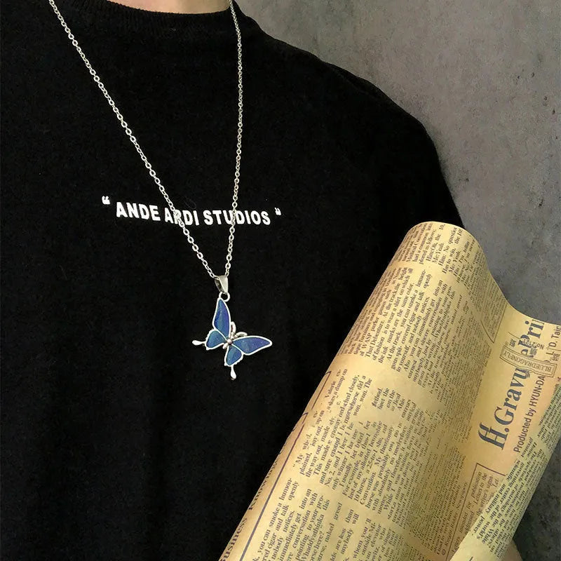 Retro colour-changing butterfly necklace on alloy O-ring chain, unisex design in butterfly cross chain style