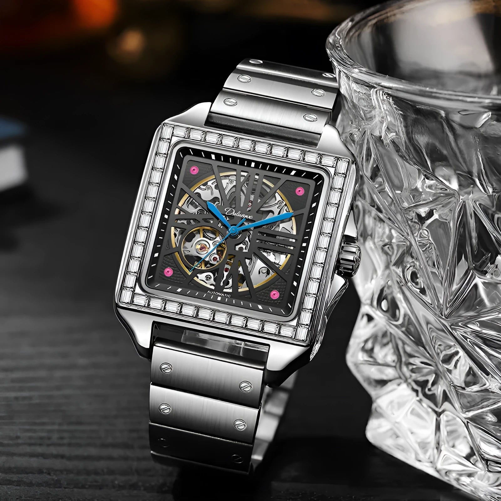 Square case automatic watch for men with diamond-studded bezel on a stainless steel bracelet