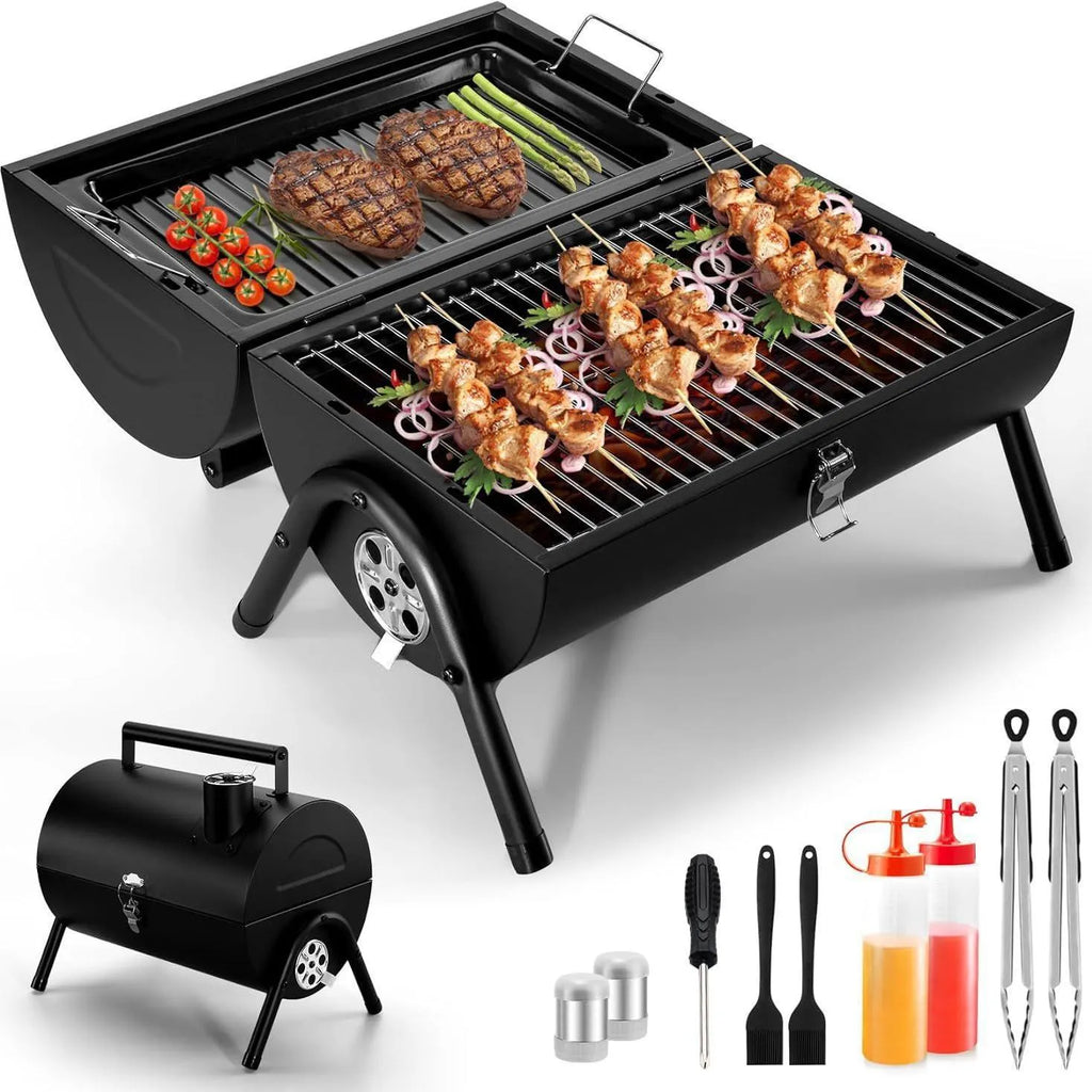 Small black folding metal desktop barbecue with a grill, set up for use.