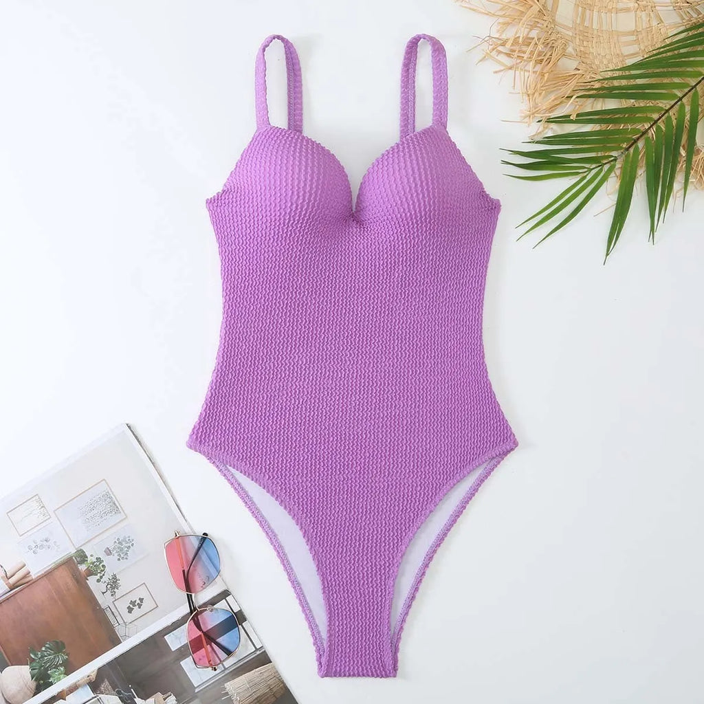 Women's sleeveless one-piece swimsuit with sunk stripe pattern in polyester fabric