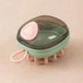 Blue 2-in-1 pet bathing brush with silicone head and integrated shampoo dispenser held in a hand.