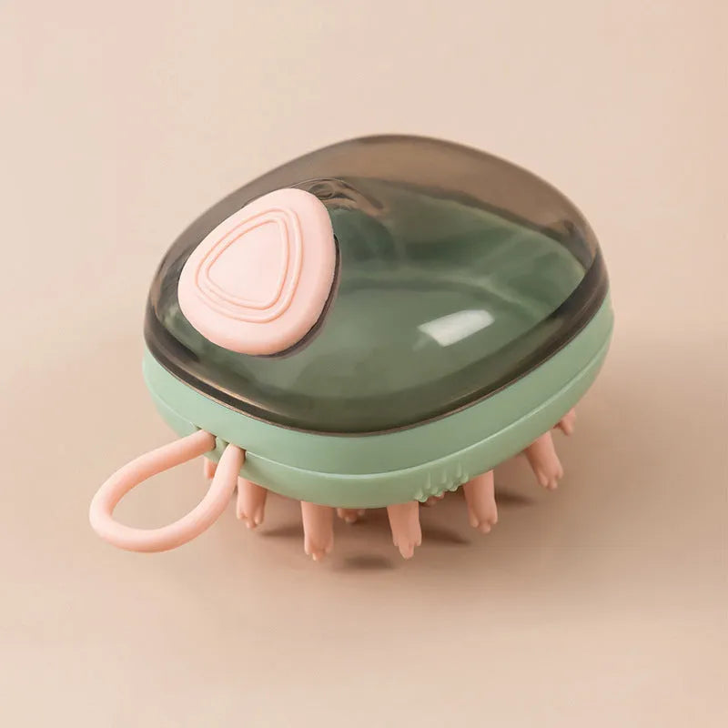 Blue 2-in-1 pet bathing brush with silicone head and integrated shampoo dispenser held in a hand.