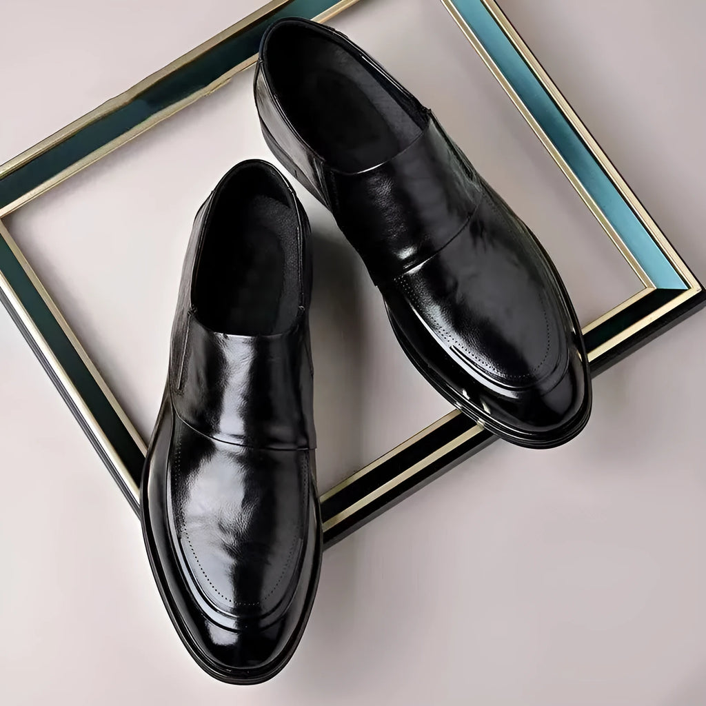 Business formal slip-on shoes with pointed toe, PU upper, rubber sole, and decorative metal and embossed details