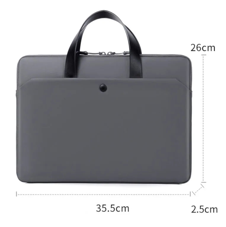 Ultra-thin leather laptop case in light grey with zipper closure and soft handle for 14 inch devices