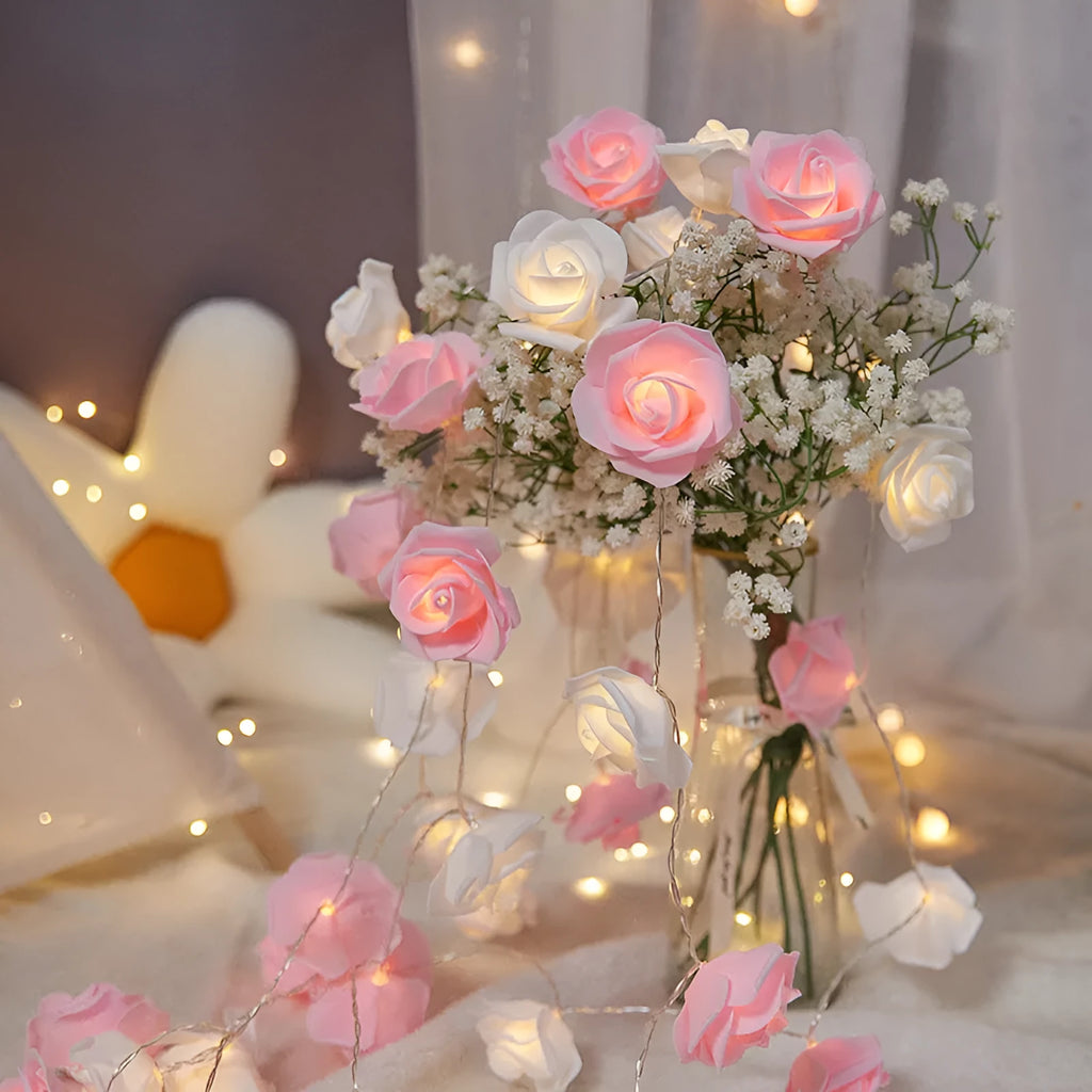 LED rose fairy lights with battery pack showing pink foam rose-shaped covers on 1.5 metre cable