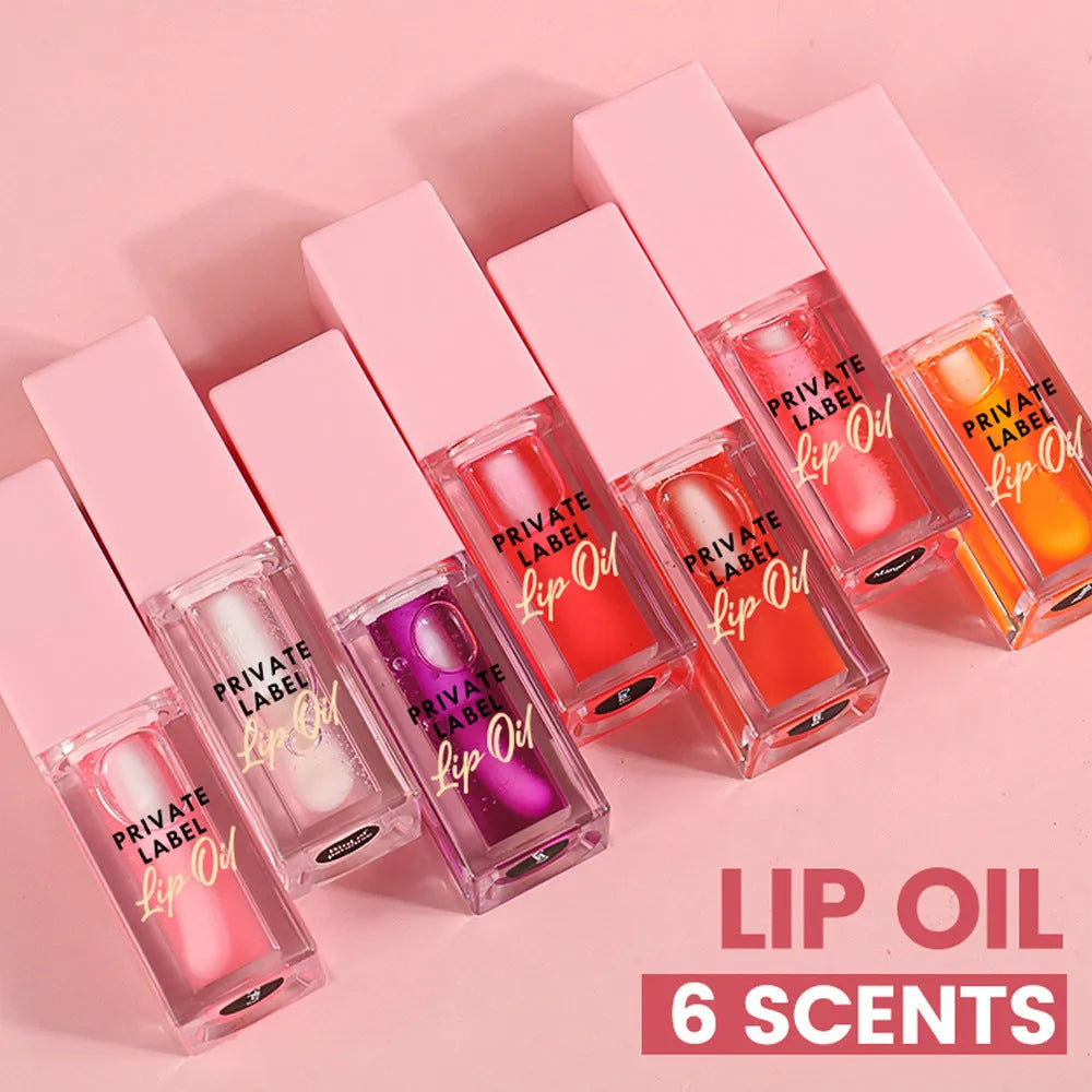Natural transparent lip gloss tube in six fruit shades: bird of paradise, cherry, coral, mango, strawberry, watermelon