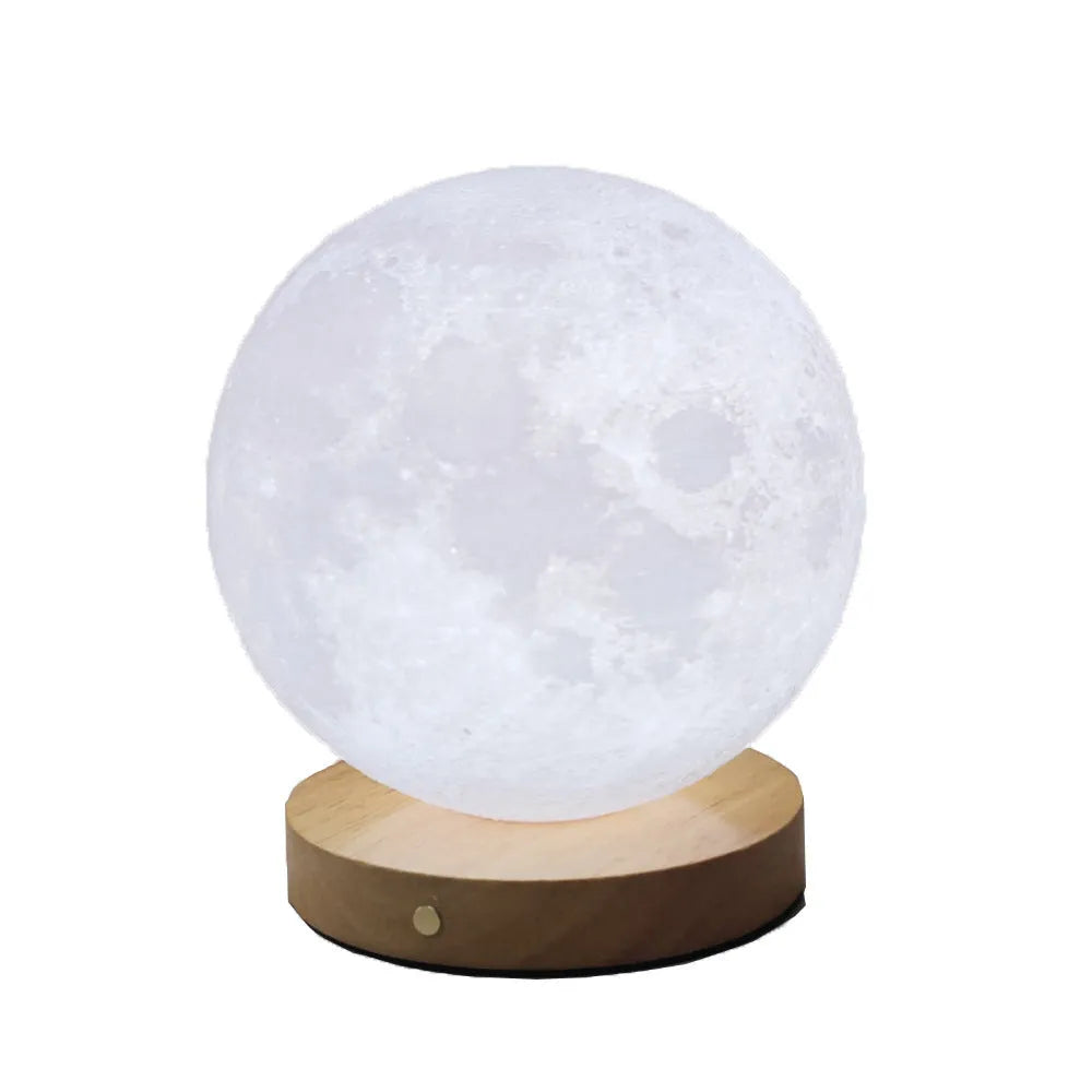 Rotating moon night lamp with wooden base showing three colour lighting options