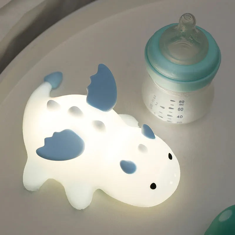 Soft light seven-color atmosphere small night lamp in cream colour with cartoon design, measuring 157 x 117 x 67 mm