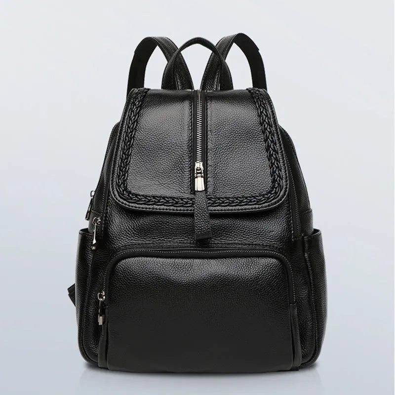 Genuine leather blue women's backpack showing front sandwich pocket and street trend design.