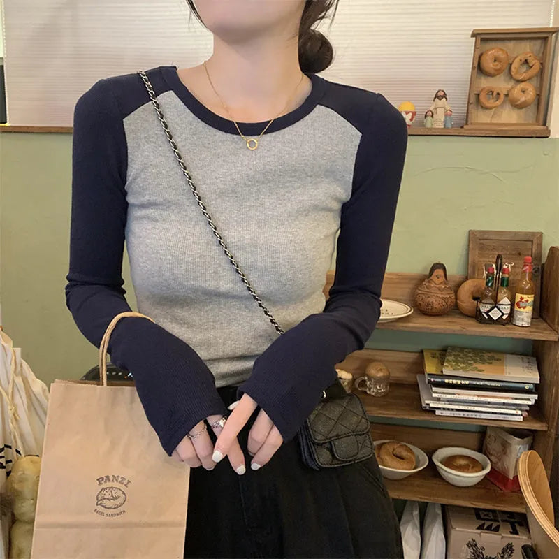 Oversized women's casual top with embroidery on princess sleeves in viscose fabric