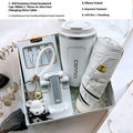 Metal business gift set with bracket, keychain, umbrella, cup, and data cable on a neutral background
