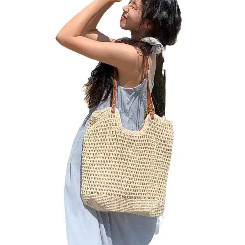Beige woven cotton linen shoulder bag shown in small and large sizes with magnetic snap and zipper closure options