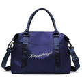 Medium fitness sports travel duffel bag in Oxford cloth with zip closure, soft handle, and luggage belt