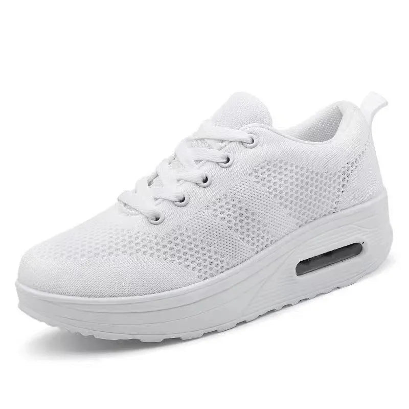 Women's solid colour flyknit platform casual shoes with a vulcanised air cushion sole and T-shaped ribbon.