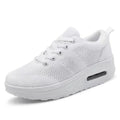 Women's solid colour flyknit platform casual shoes with a vulcanised air cushion sole and T-shaped ribbon.