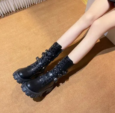 Women's black mid-calf knight boots with a metal buckle and side zip fastening