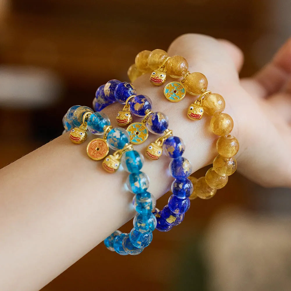 Handmade colourful fragrant grey gold foil glaze swallowing gold beast bracelet in geometric shape.