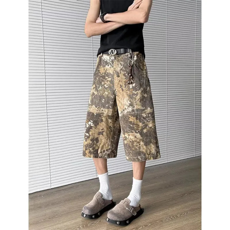 Yellow snake pattern camouflage cropped jeans on hanger showing cotton denim fabric