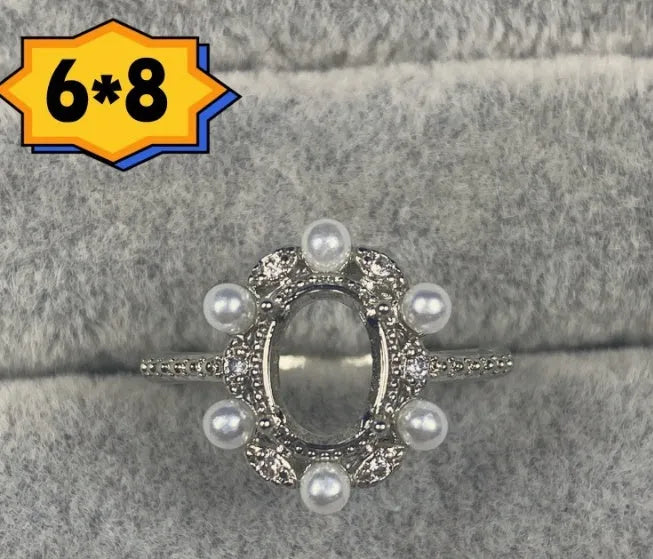 Oval open mouth ring with 6x8mm stone and five-pointed star design on electroplated copper