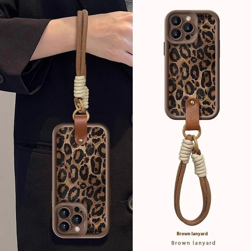 Brown leopard print silicone phone case with a detachable lanyard for an iPhone.